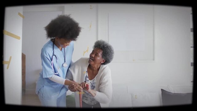 Healthcare worker entering room, bending, steadying red cane and guiding senior to stand safely