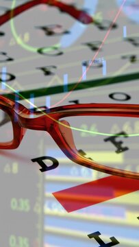 Vertical video: Glasses entering, settling on sheet, animating finance data, highlighting red mark