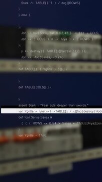 Vertical video: Monitor autoscrolling code, white bar moving, revealing orange cable for IT ops