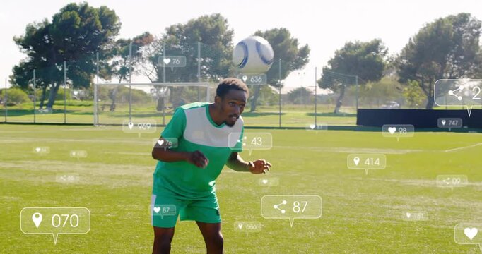 On field, soccer player interacting with animation of social media icons