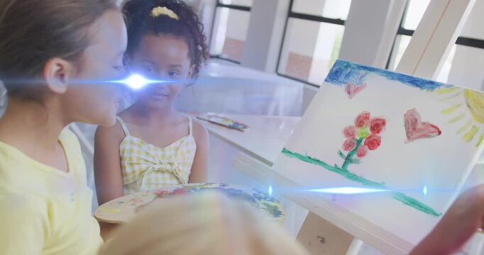 Animation of light trails over diverse schoolchildren painting