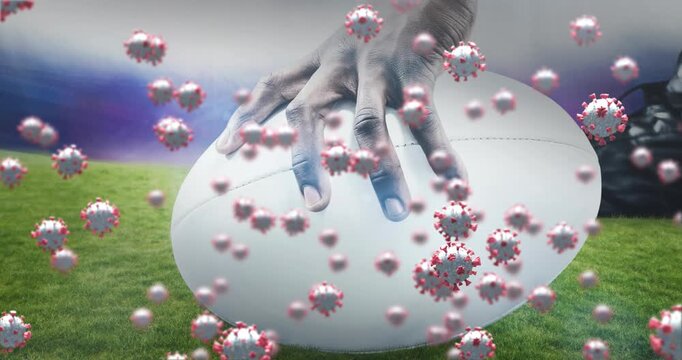 Animation of falling covid 19 cells over american football ball