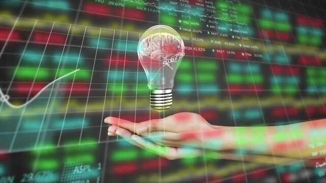 Animation of human brain in a light bulb icon over cupped hands against stock market data processing