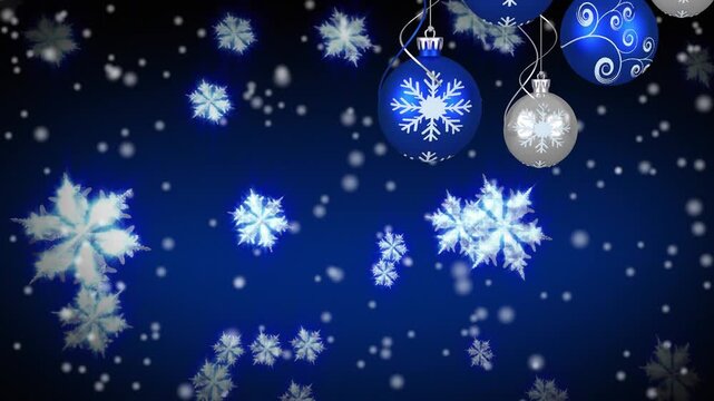 Animation of falling snow and christmas decorations over blue background