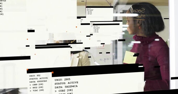 Two women collaborating in business, left pointing on glass causing glitch overlays obscuring view