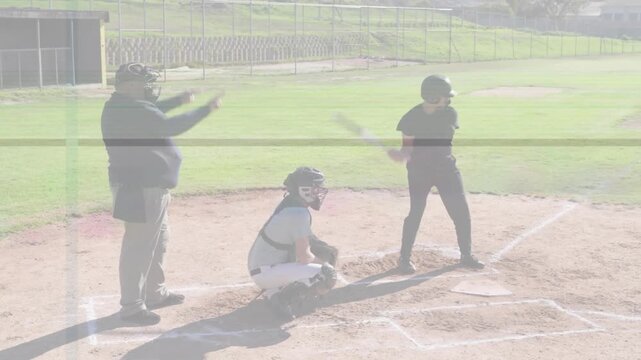 Baseball pitcher throwing batter swinging catcher catching umpire signaling strike with strikebox