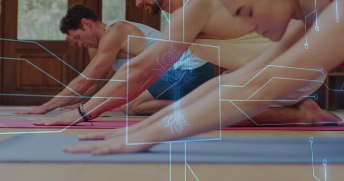 Hearing teacher cue, class in gymwear sliding hands forward, extending arms on mats HUD for stretch