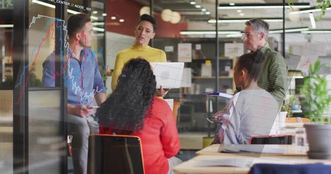 Presenter opening laptop showing data, woman in red pointing phone, charts on glass for business