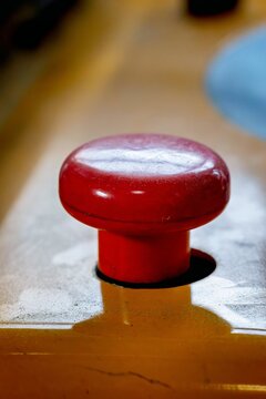 red emergency stop switch for work safety