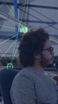 Vertical video: Tech dev turning to passing peer as neon camera or gauge icons moving closer, replyi