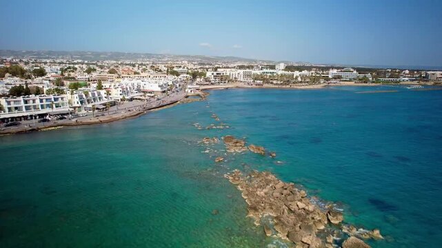 Aerial view of the beautiful paphos coastline in cyprus with clear turquoise mediterranean waters