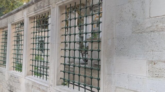 Durable wrought iron cemetery railings for safety and aesthetics.