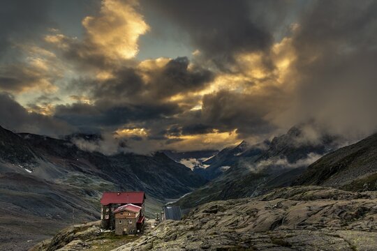 Siegerlandh&uuml;tte at sunset with dramatic cloudy sky, S&ouml;lden, &Ouml;tztal, Tyrol, Austria