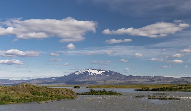 River &THORN;j&oacute;rs&aacute;, snow-covered volcanic cone Hekla, South Iceland, Iceland
