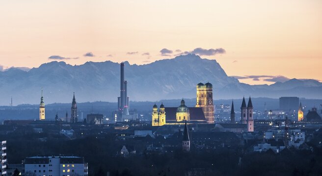 View over Munich with Church of Our Lady, Theatine Church, Ludwigskirche, in the back Zugspitze at evening mood, Munich, Upper Bavaria, Bavaria, Germany
