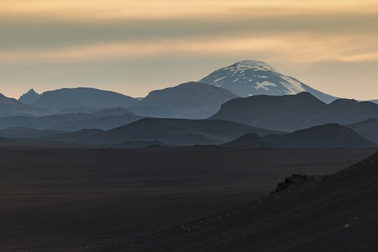 Evening light, mountains and volcanic cone Hekla, South Iceland, Iceland