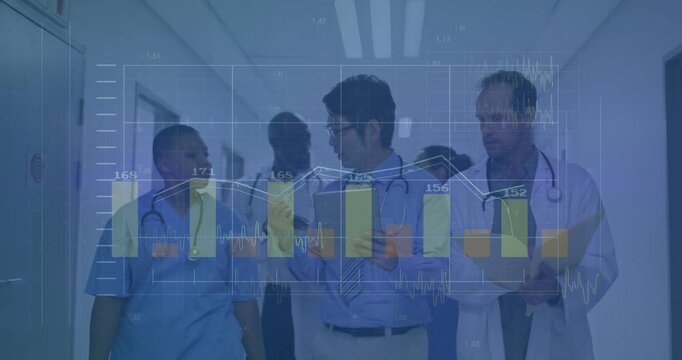 Medical team walking ward as lead MD tapping tablet causing data overlay showing charts for rounds