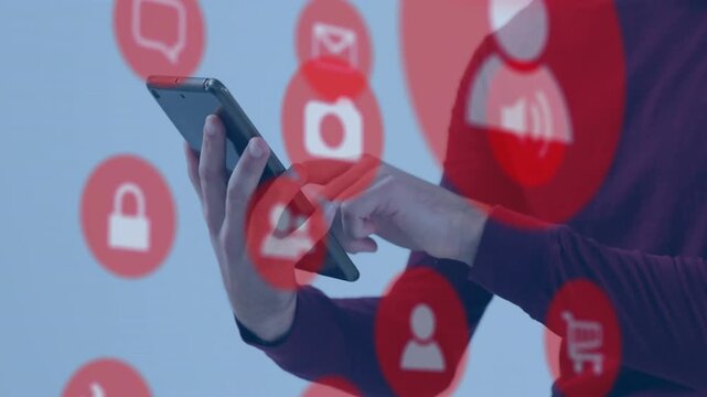 Man presenting phablet, right index finger tapping screen, red icons shifting, showing mobile tech
