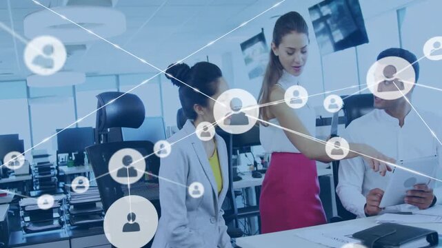 Vertical video: Marketing team pointing and studying tablet in office forming animated user network