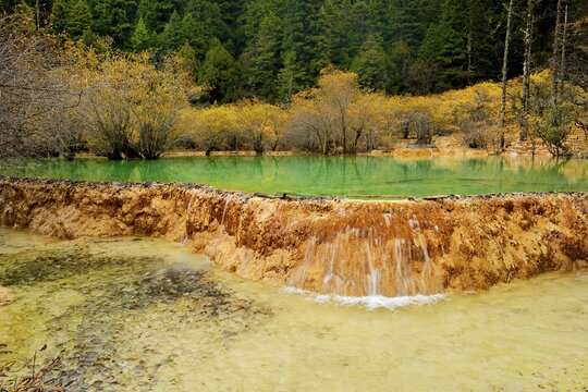 Lime terraces with lakes in autumnal environment, Huanglong National Park, Sichuan Province, China