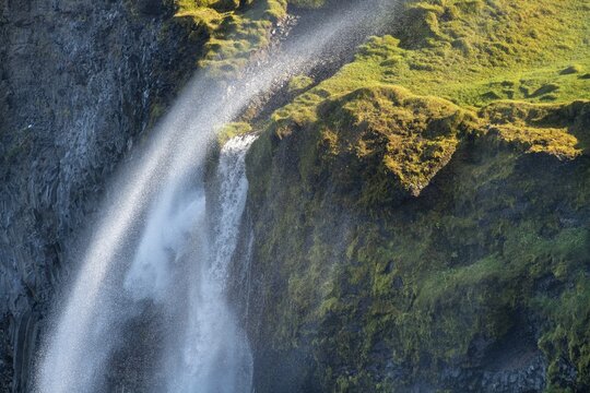 Waterfall falls over cliff and is blown away by wind, Skagi Peninsula, Skagafj&ouml;r&eth;ur, Nor&eth;urland vestra, Iceland