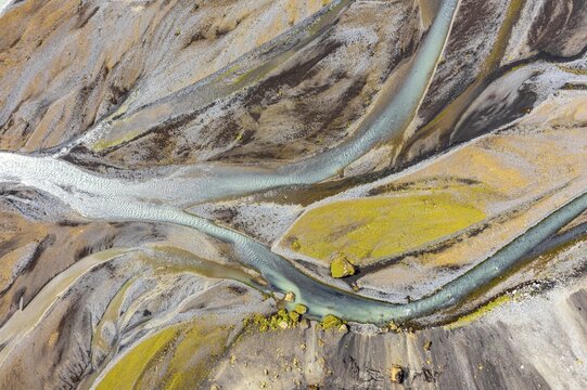 Blue river arms flowing through lava sand, meandering river from above, Affr&eacute;tis&aacute; river, Icelandic highlands, aerial view, &THORN;akgil, Iceland