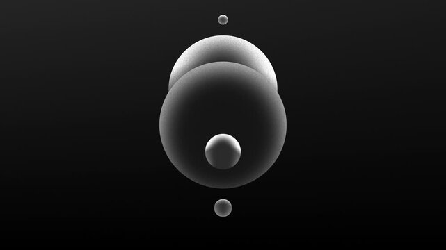 Multiple monochrome shaded spheres drift to align themselves in a smooth, endless animation loop, with soft gradients shaping depth and light as the orbs hover in a balanced, minimal dark space