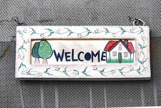 Welcome sign on a front door