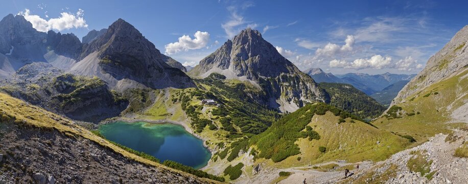 Mountain panorama above the Drachensee and the Coburger H&uuml;tte with the mountain peaks of the Sonnenspitze, Drachenkopf, Coburger H&uuml;tte, Ehrwalder Alm, Ehrwald, Mieminger Gebirge, Tyrol, Austria