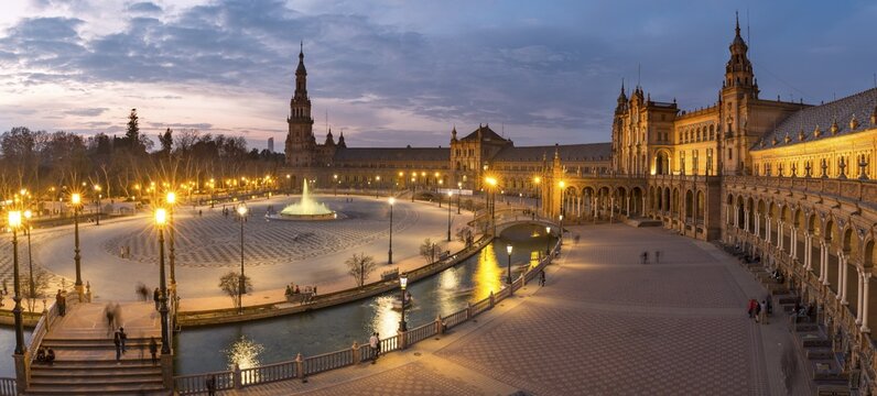 Illuminated Plaza de Espa&ntilde;a at dusk, Seville, Andalusia, Spain