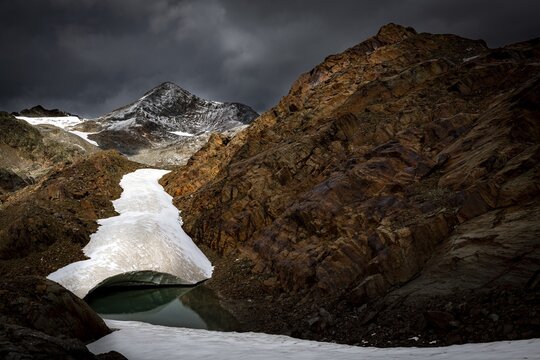 &Ouml;tztal mountains with glacier remains and dramatic sky, S&ouml;lden, &Ouml;tztal, Tyrol, Austria