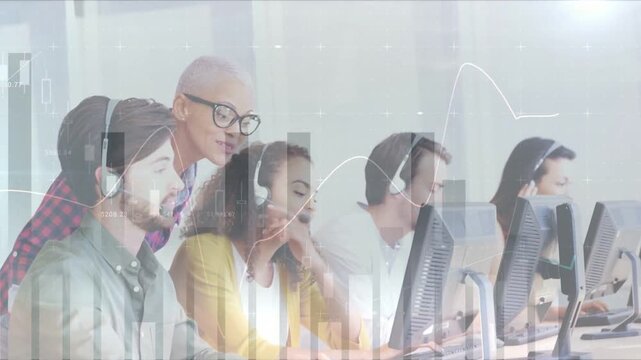 Trainer leaning in, coaching five call-center agents typing while animated charts showing KPIs