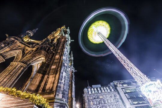 Carousel of the Edinburgh Christmas Market, Scott Monument at Night, Edinburgh, Scotland, Great Britain