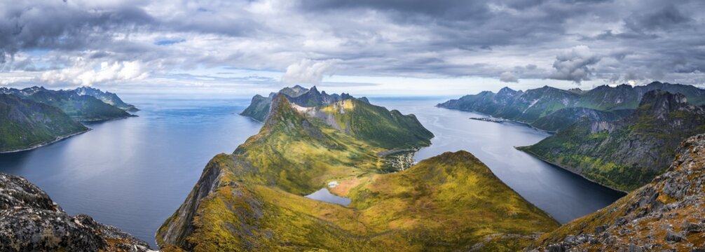 Mountain panorama, fjord and mountains, in the back Fjordgard and mountain Segla, view from mountain Barden, Senja, Norway
