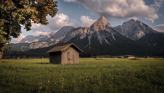 Haystack, hut in a meadow, Sonnenspitze at the back, mountain landscape, Tyrolean Alps, near Ehrwald, Tyrol, Austria