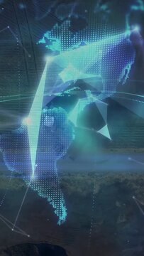 Vertical video: Rider standing by bike dirt road, frames showing tech mesh forming globe over bike