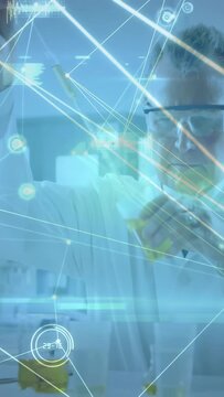 Vertical video: Gloved lab scientist lifting vial and inspecting color clarity particles under HUD