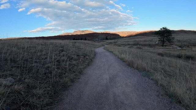 Immersive POV from sunset recumbent trike ride on a rough mountain trail in northern Colorado foothills - Bobcat Ridge Natural Area