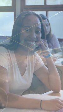 Vertical video: Digital overlay appearing then drifting over smiling student, visualizing network