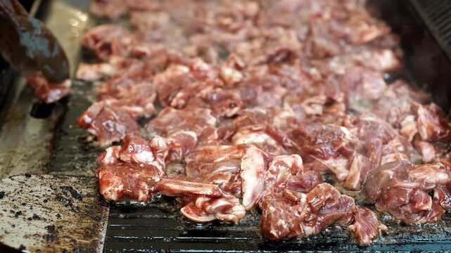 Kambing Golek Marinated Goat Meat Being Grilled
