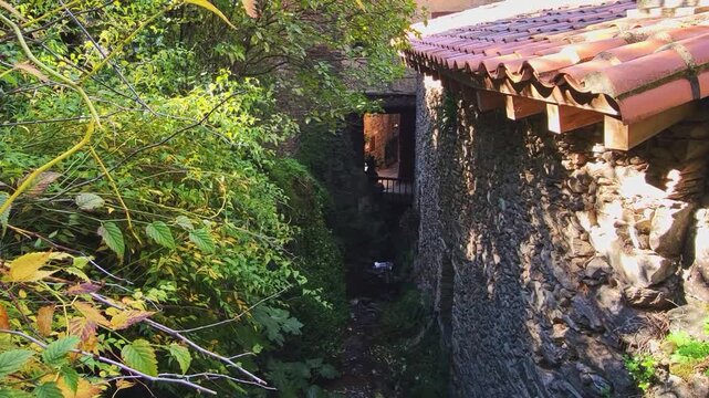 The springs of Robledillo de Gata. Water springs that run through the streets of an old village built with stone and slate. A famous and charming Spanish village.