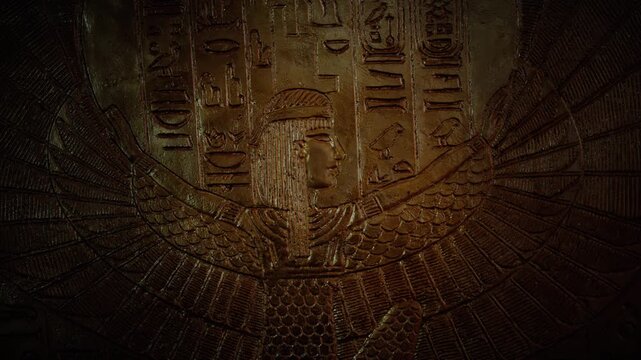 Isis Wall Carving on Golden Wall Tomb Macro Goddess Spread Wings Ancient Egypt in the Dark