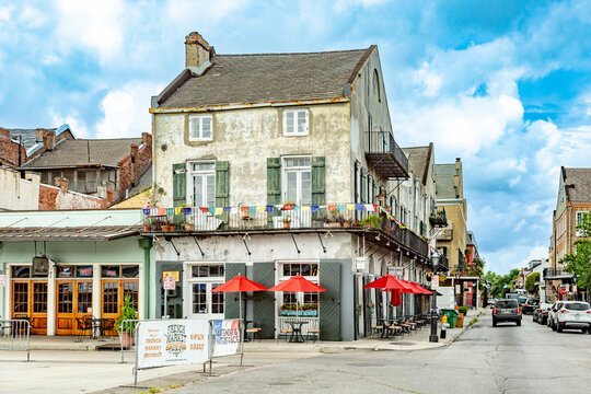 old house with typical decoration and a restaurant in the Historic French Market in New Orleans, USA.