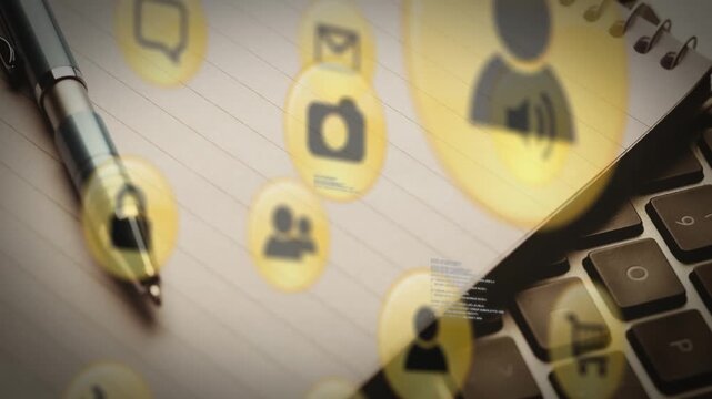 Animation of multiple digital icons against close up of pen, notepad and laptop