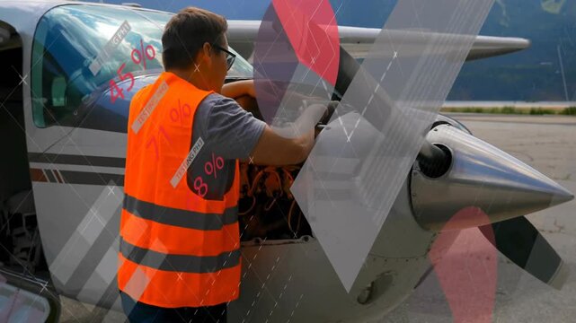 Technician unlatching cowling and inspecting engine for preflight aviation check with data graphics