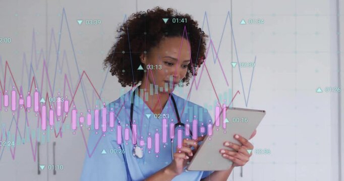 Healthcare professional tapping tablet and activating chart overlays reviewing patient metrics