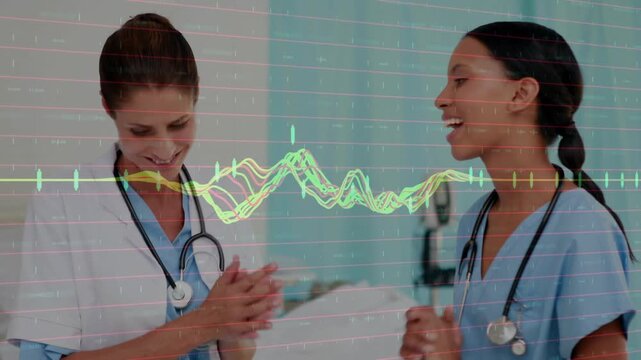 Medical ECG waveform sweeping across frame initiating doctor explaining readings and nurse nodding