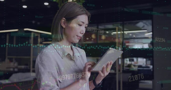Animation of financial data processing over asian businesswoman at office