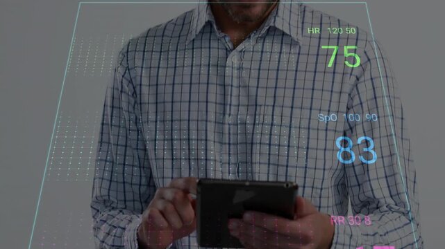 Man tapping tablet, checking HUD medical vitals green HR blue SpO2 pink RR animating, camera rising