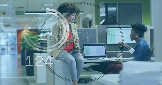 Woman on seat tapping phone causing HUD countdown overlaying spreadsheet peer pointing for business